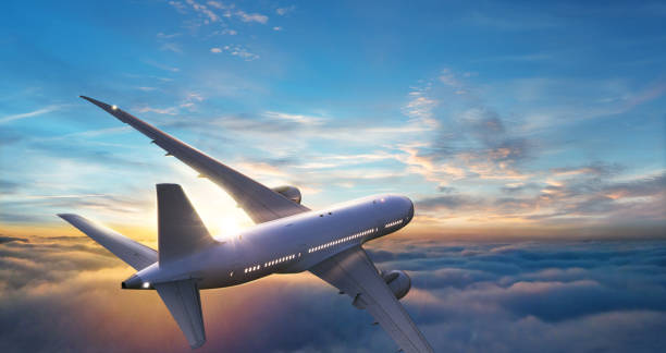 istock Passengers commercial airplane flying above clouds 1132486062