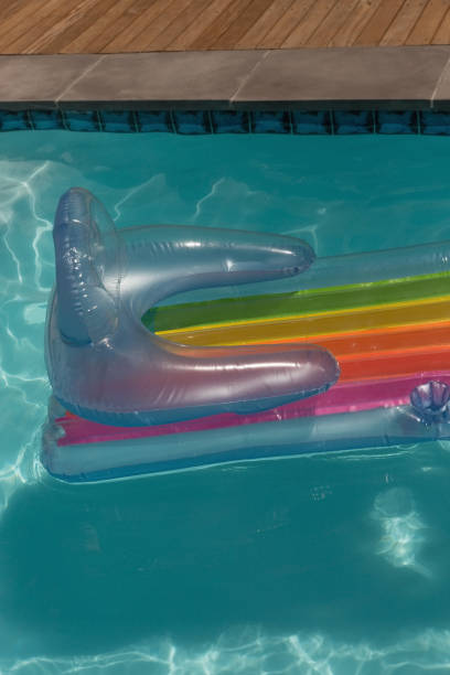 istock Inflatable tube floating in a swimming pool 1132487106