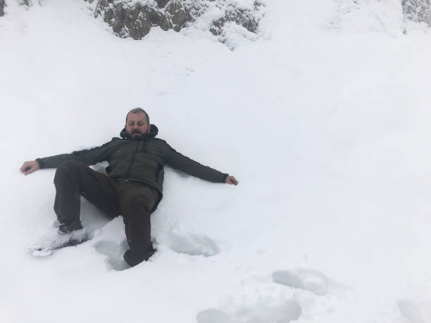 istock Wintery scene of a man 1132487119