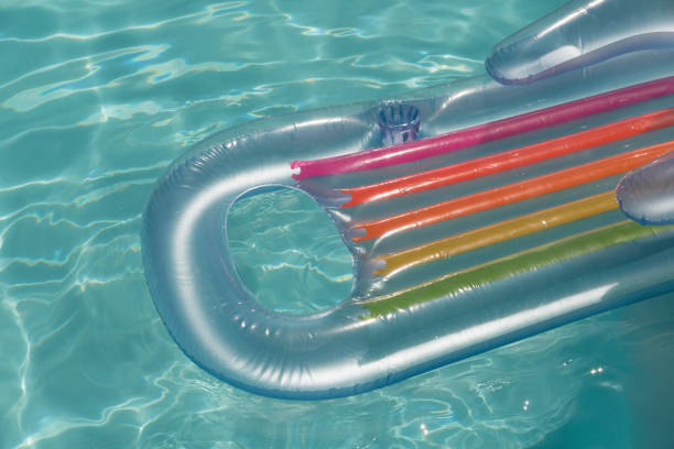 istock Inflatable tube floating in a swimming pool 1132487147