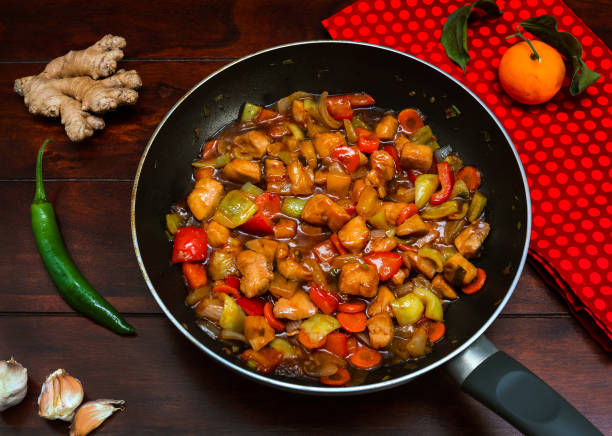istock Fried stir chicken with and rise. Asian cuisine. 1132487267