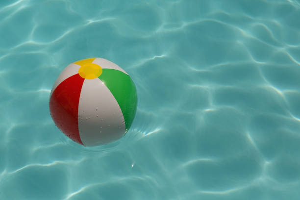 istock Inflatable ball floating in swimming pool 1132487303