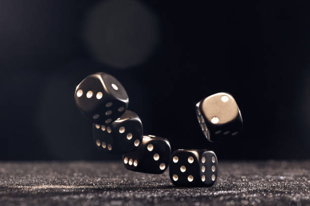 istock Picture of several black cubes falling on a black background. 1132488309