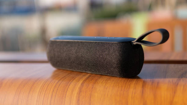 istock wireless speaker in use. Music lovers and modern audio technology 1132489156