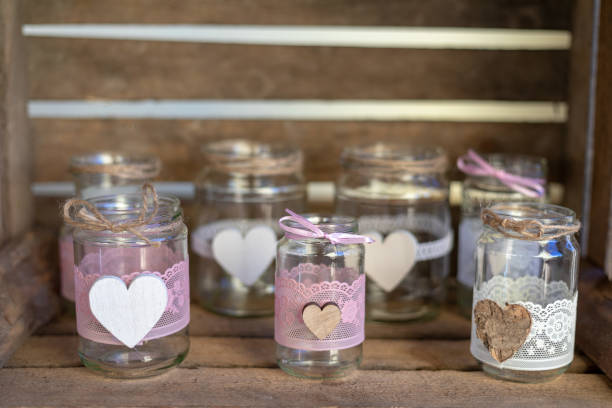 istock Glass jug with a wood heart 1132489206