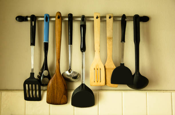 istock set of kitchen utensils hanging 1132490665