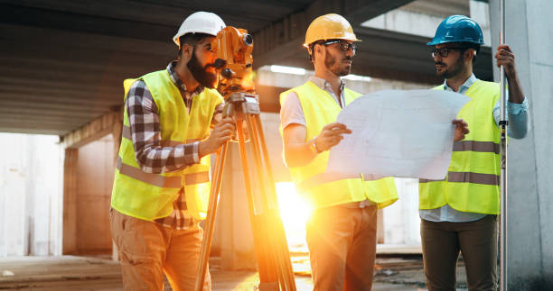 istock Team of architects people in group on construciton site 1132491164