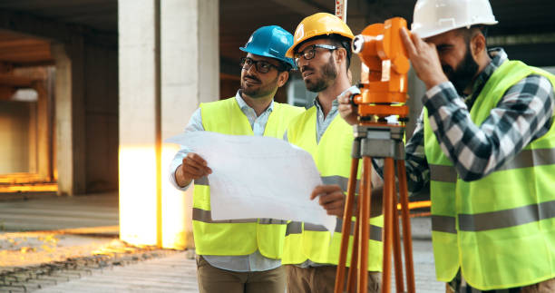 istock Portrait of construction engineers working on building site 1132491179