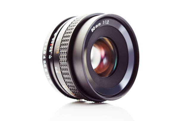 istock DSLR camera lens on white background 1132494153