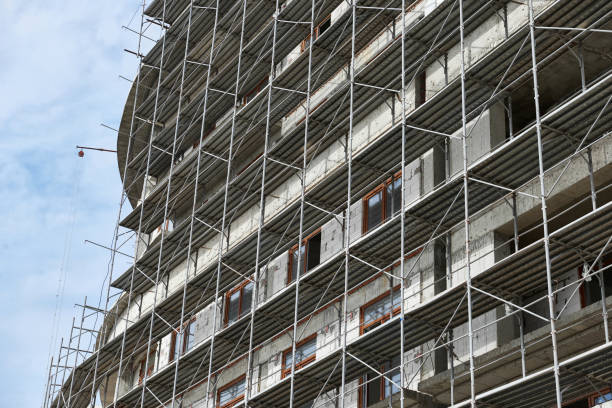 istock new building under construction, scaffolding and concrete 1132494233