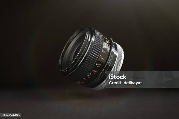 Dslr Camera Lens Floating In The Air Stock Photo - Download Image Now - Camera - Photographic Equipment, Lens - Optical Instrument, Levitation