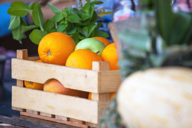 ripe juicy oranges in a box