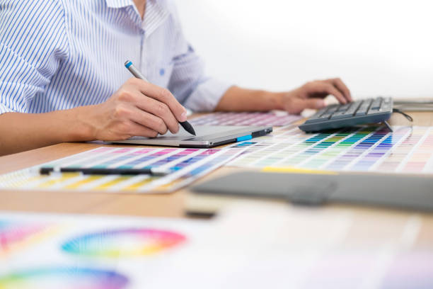 istock Midsection Of Businessman Writing In Diary At Desk 1132498369