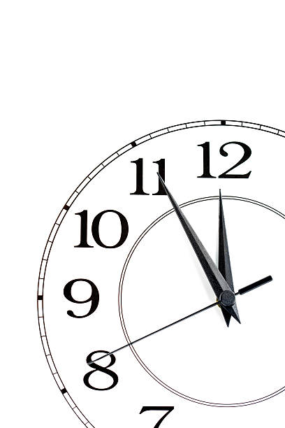 blanc horloge indiquant le temps sur douze isolé - clock hand clock coding watch photos et images de collection