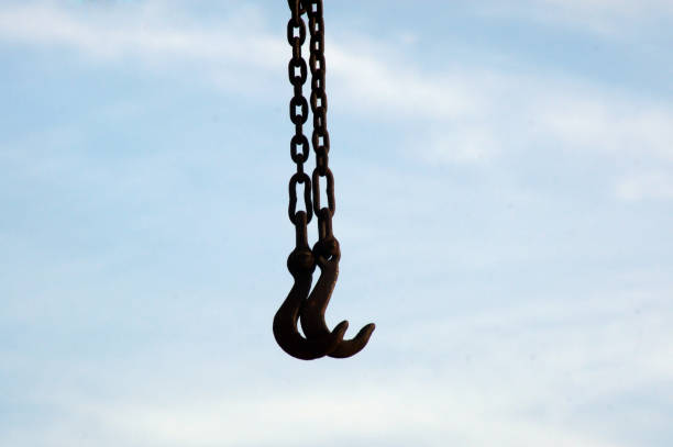 Close-up of a hook chain of a crane