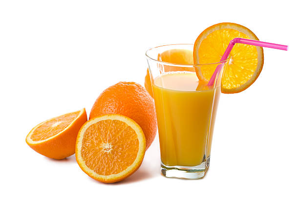 istock glass of orange juice and oranges isolated 113250018