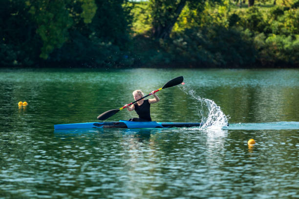 istock Woman Kayaking In Lake 1132501526