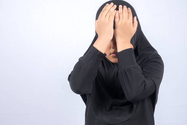 istock Girl Wearing Hijab Over White Background 1132502675