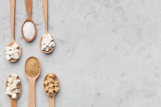 istock Collection of different kinds of sugar on gray background 1132503624