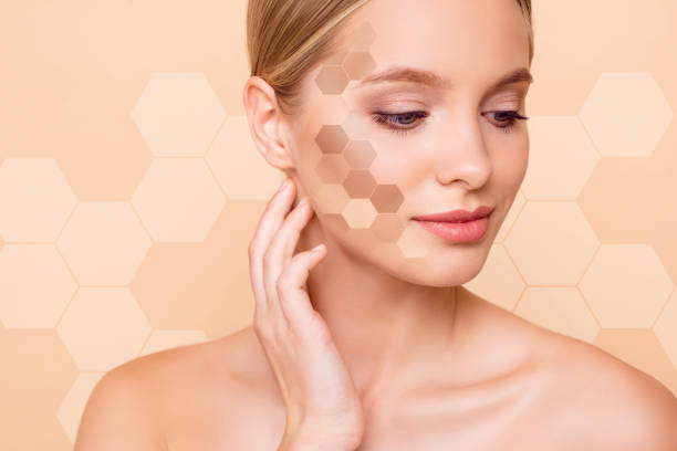 close-up portrait of her she nice winsome lovely attractive perfect ideal peaceful girl touching neck different tone honey combs cells isolated on beige pastel background - women tan perfection naked imagens e fotografias de stock