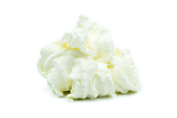 istock Whipped cream isolated on white background 1132503700