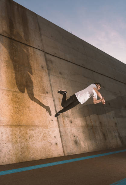 istock young sportsman practicing parkour. 1132504545