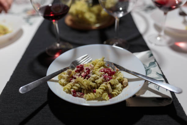 istock Pesto pasta and wine for dinner 1132507223