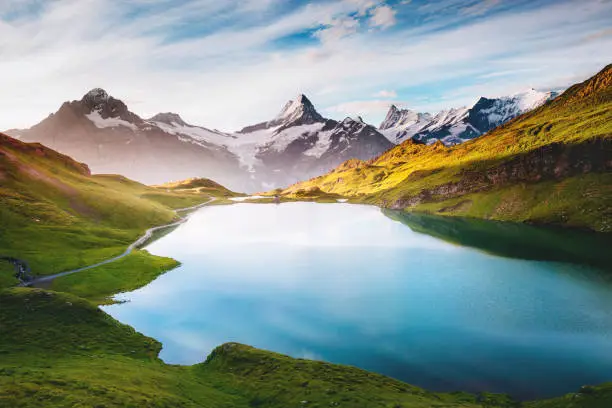 Panorama of Mt. Schreckhorn and Wetterhorn. Popular tourist attraction. Dramatic and picturesque scene. Location place Bachalpsee in Swiss alps, Bernese Oberland, Grindelwald, Europe. Beauty world.