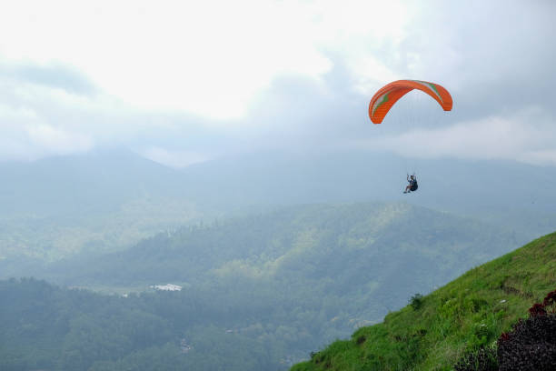 istock Sky racing by paragliding in Batu Malang, east java, Indonesia. 1132510803