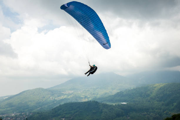istock Sky racing by paragliding in Batu Malang, east java, Indonesia. 1132512069