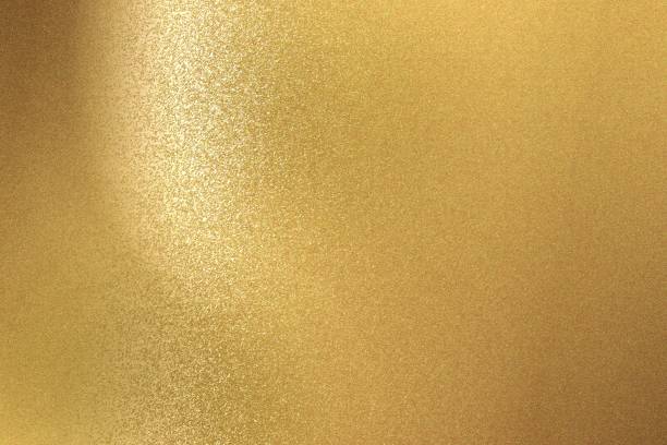sfondo astratto, texture della parete in acciaio dorato spazzolato - bronze brass textured copper foto e immagini stock
