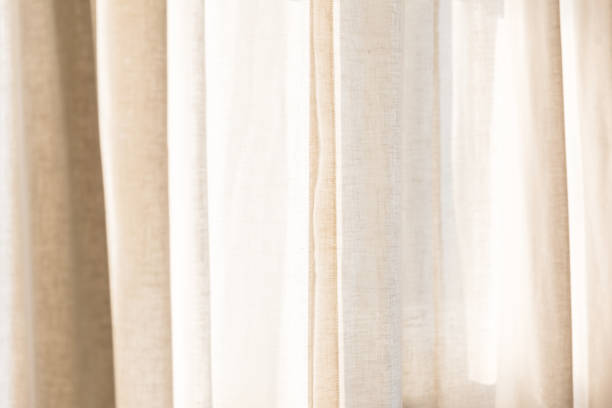istock morning sunlight through curtain in room 1132514454
