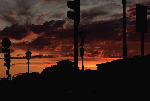 Florence, Italy - September 20, 2017. Sunset over Florence. Red sky. silhouettes of houses.