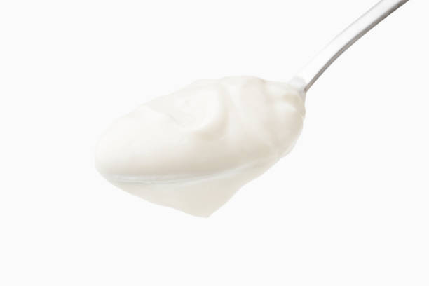 istock Full spoon of yougurt 1132525907