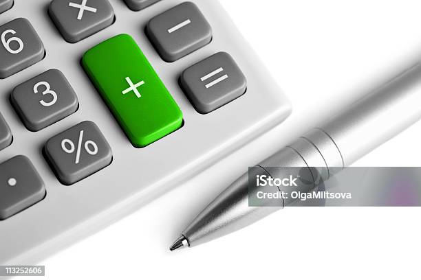 Calculator And Pen Plus Button Colored Green Stock Photo - Download Image Now - Balance, Business, Calculator