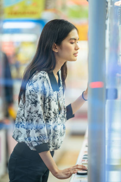 istock Young woman enjoying in arcade 1132529971