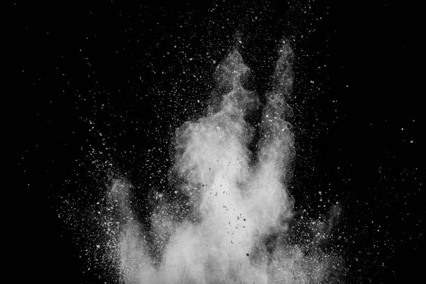 istock White powder explosion isolated on black background. White dust particles splash.Color Holi Festival. 1132535620