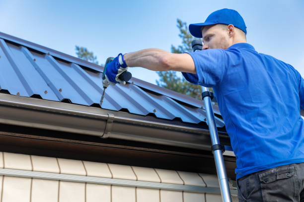 istock metal roofing - roofer working on the house roof 1132536564
