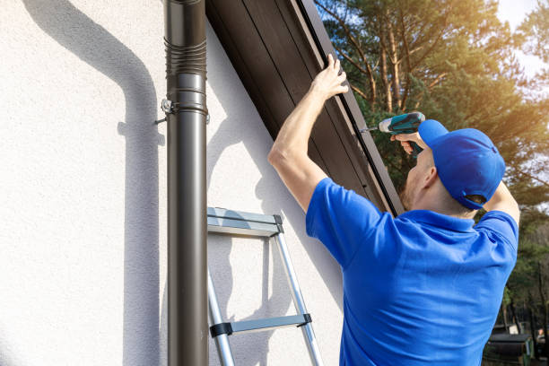 istock roofer installing metal roof drip edge profile 1132536565