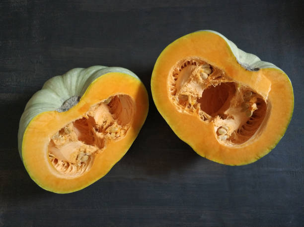 istock Sliced pumpkin on a wood board 1132537366