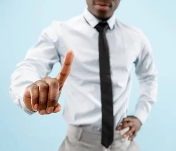 Photo of Businessman hand touching empty virtual screen