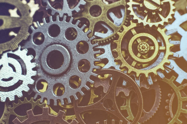 istock Conceptual image of industry, mecanics, connection or team work. Background from different metal gears. 1132541278
