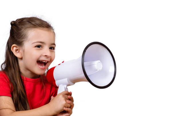 istock Little girl screaming on a megaphone. 1132541947