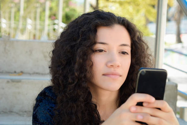 istock Young women sending message with smartphone. 1132542021
