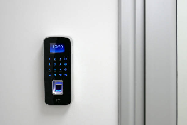 istock Digital door lock, modern safety technologies. Fingerprint equipment identificator. Biometric scanning device with keypad verification. 1132542584