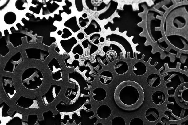 istock Conceptual image of industry, mecanics, connection or team work. Background from different metal gears. 1132542970