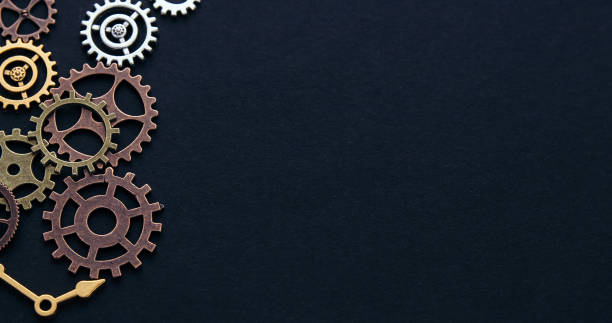 Conceptual image of industry, mechanics, connection or team work. Background from different metal gears.