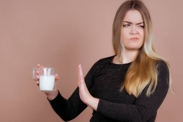 istock cute girl drinks milk 1132548785