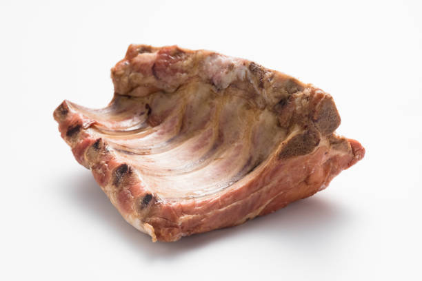 Smoked pork ribs on a white background