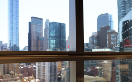Manhattan Skyline from a Window, NYC.